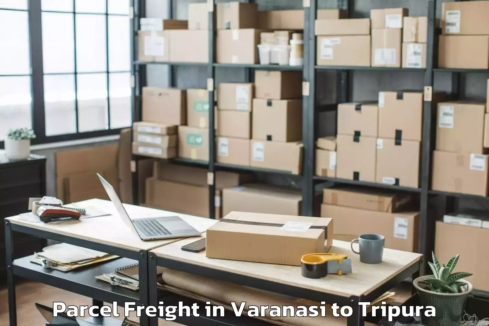 Get Varanasi to Manughat Parcel Freight